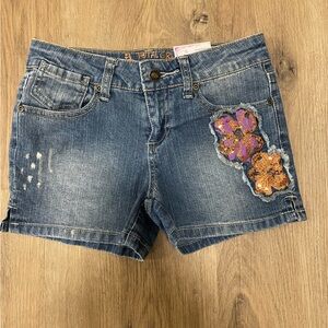 NWT girls jean shorts with cute little floral embellishments size 10